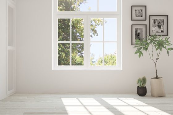 Comment nettoyer des traces de projections de ciment sur des vitres ?