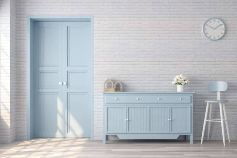 Image d'un salon avec meuble en bois peint en bleu ciel